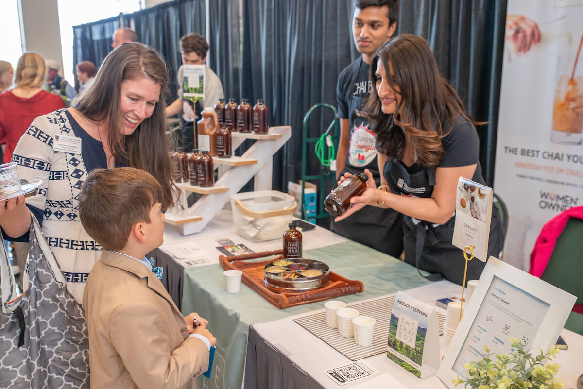 Attendees trying samples from the various finalists at the Flavor of Georgia Savor the State event.